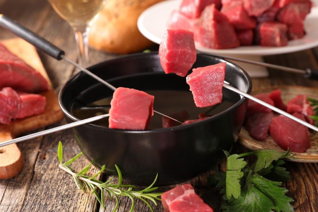 Fondue beef Fondue beef raclette dish