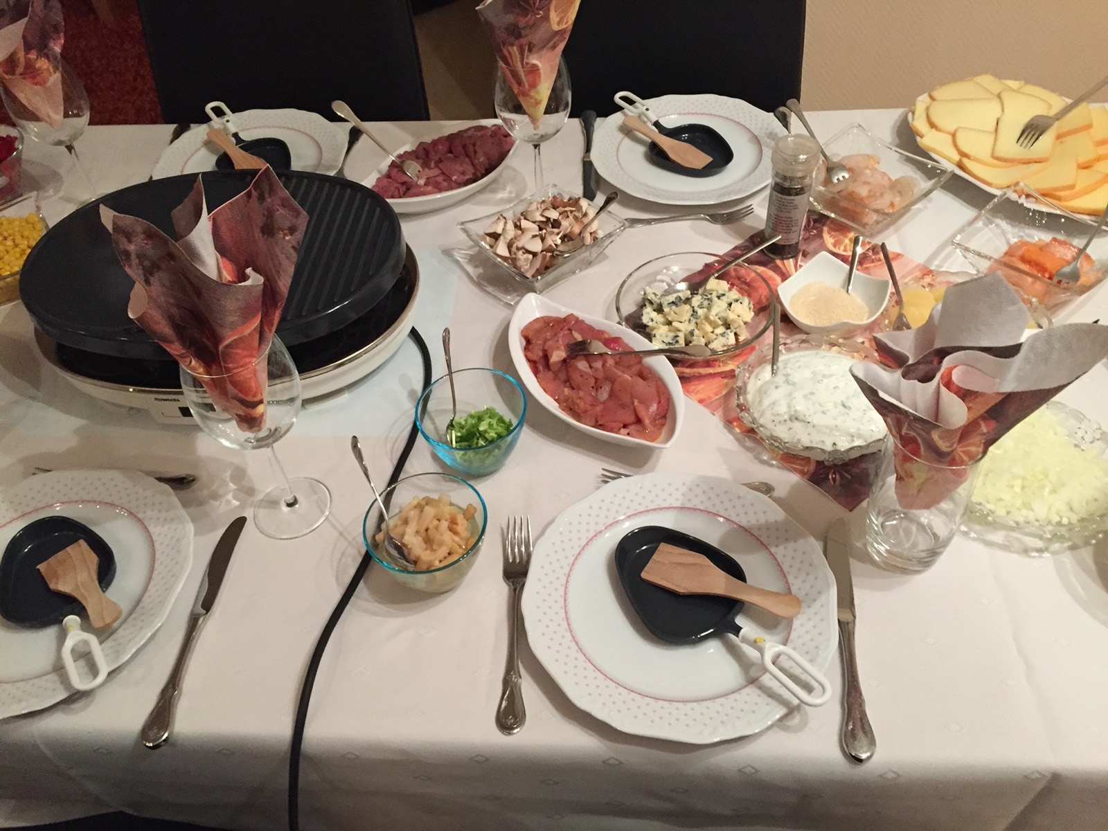 Raclette grill with ingredients ready to cook — raclette grill care and cleaning